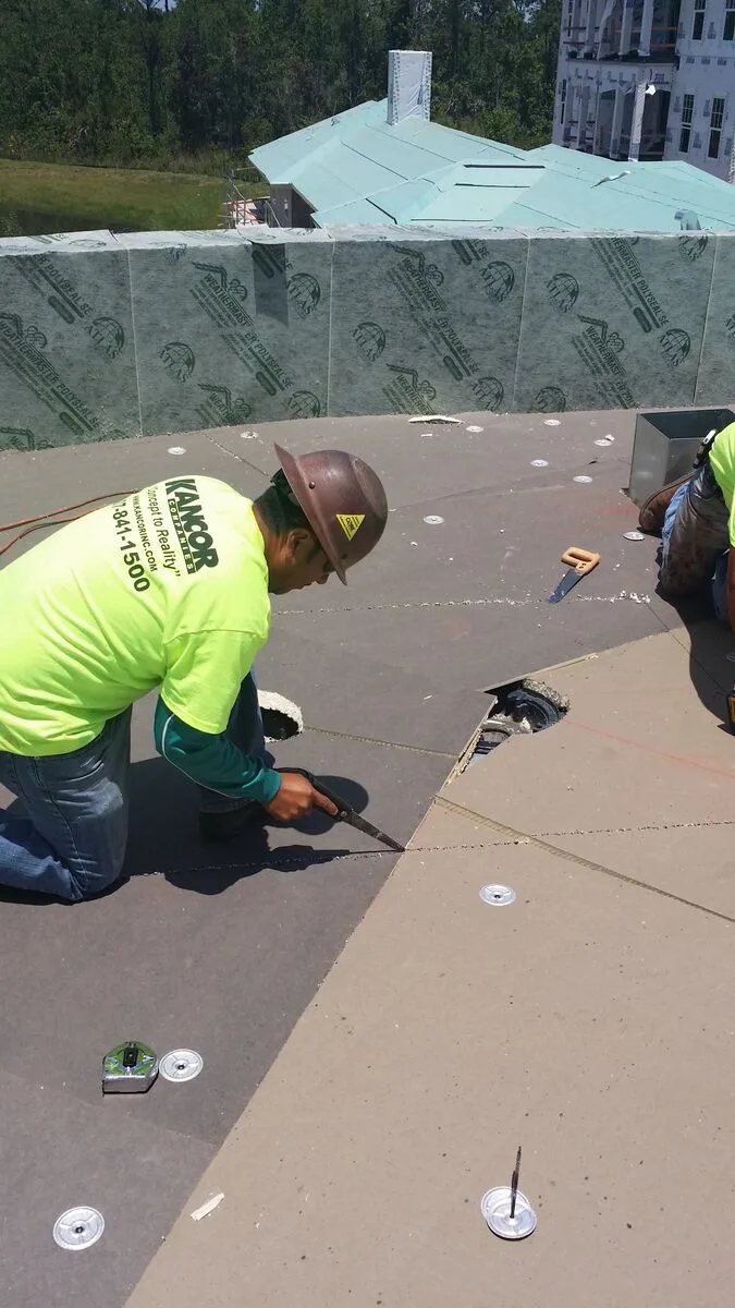 Flat roof installation crew – Preserves at Celebration by Kancor Companies, Celebration, FL