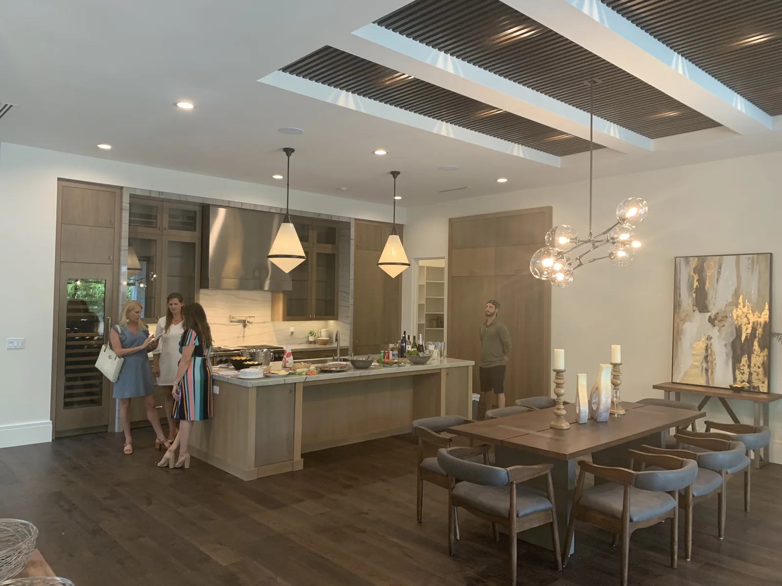 Open concept kitchen dining room – Floating Staircase Residence by Kancor Companies, Orlando, FL