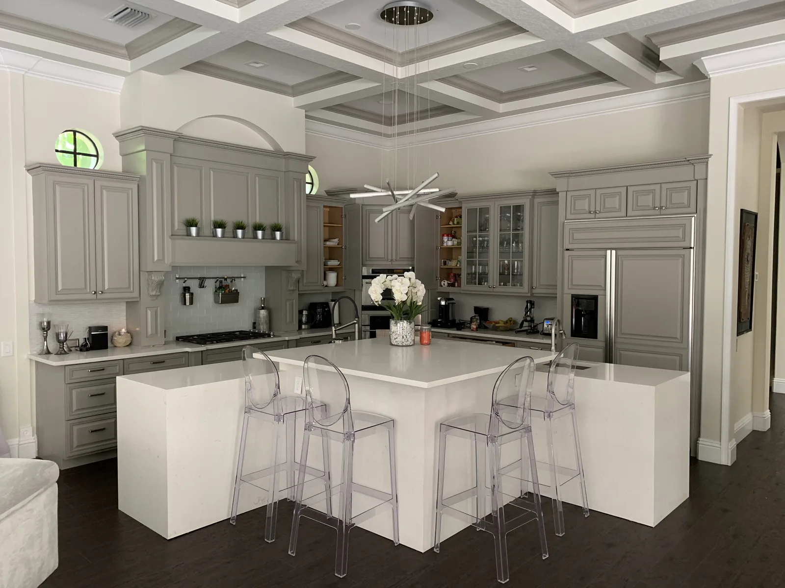 White kitchen coffered ceiling island – Grand Estate Residence by Kancor Companies, Orlando, FL